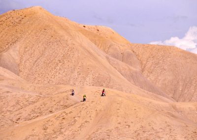 dirt bikers son hills at peach valley's adobes