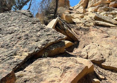 Close up shot of rocks on the back side of a trail